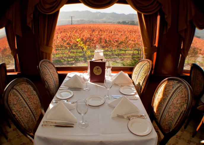 Napa-Valley-Wine-Train travel though lush countryside drinking in the wines